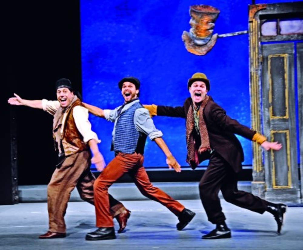 Peter Tedeschi, left, as Alfred P. Doolittle performs “With a Little Bit of Luck” with Harry and Jamie portrayed by Jonathan Olivera and Daniel Larson in Lerner and Loewe’s Broadway classic, “My Fair Lady,” being presented at Ocean State Theatre in Warwick through Oct. 19. /PHOTO | MARK TUREK